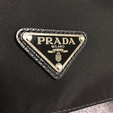 how to authenticate prada messenger bag|prada in multi color letters.